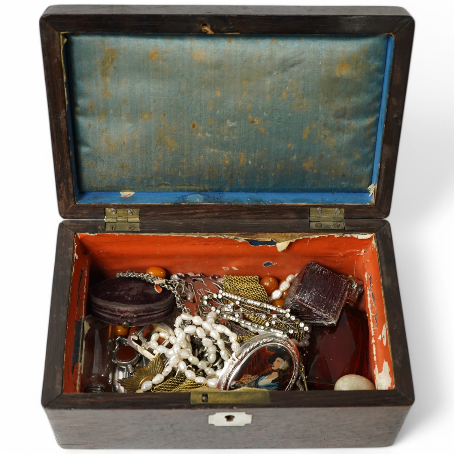 A small collection of assorted silver, white metal and jewellery including an Albert, four mounted glass scent bottles including Mordan & Co (a.f.), a hand bag mirror, a mounted desk seal, a plated wine label, a Portugue